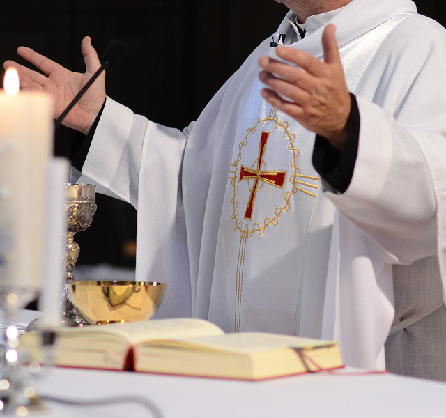 a priest doing a service