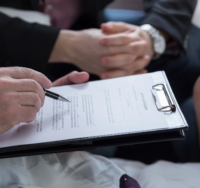 a person signing a document